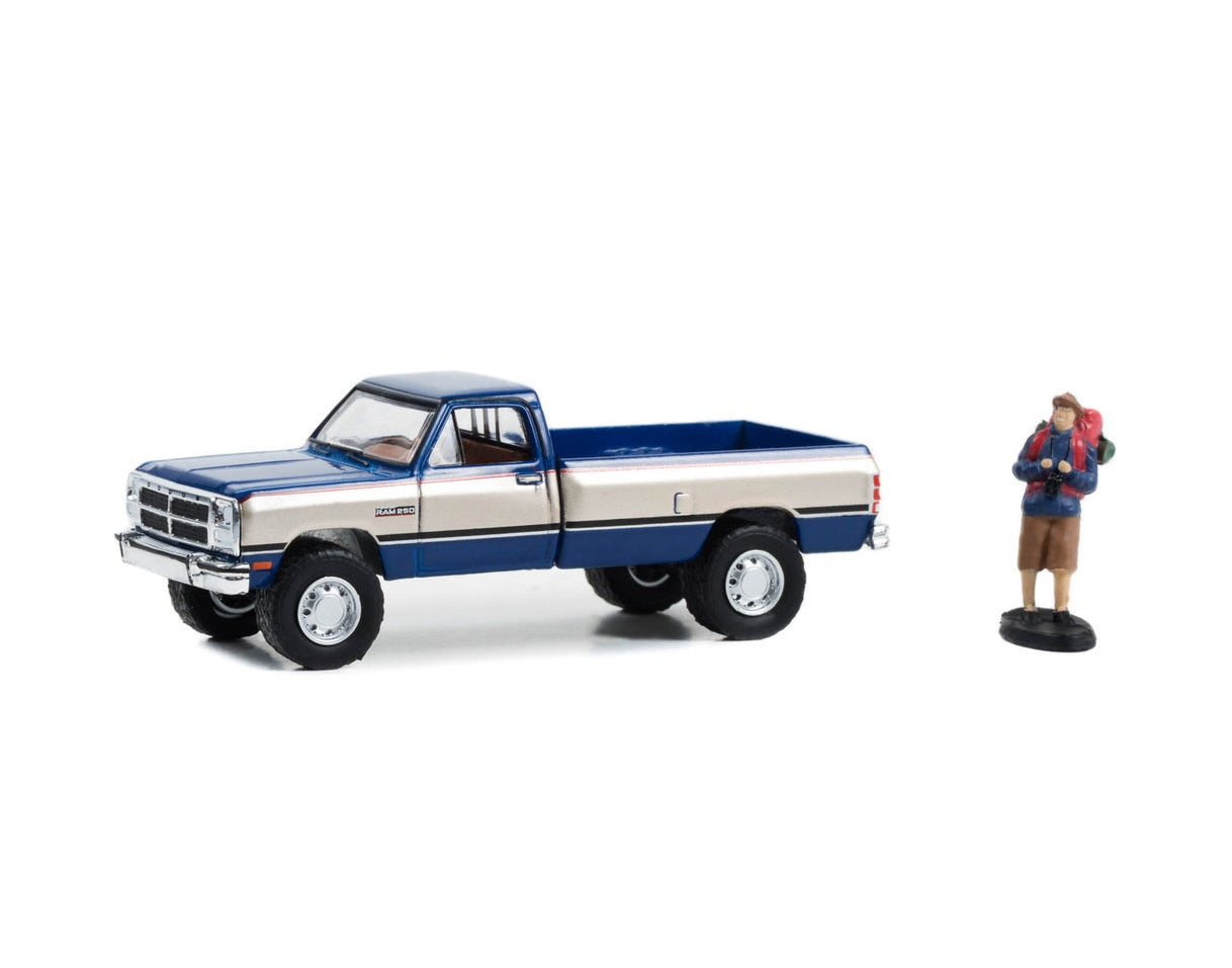 Greenliht Collectibles - 1993 Dodge Ram Power Ram 250 with Backpacker Series Hobby Shop - Scale 1/64