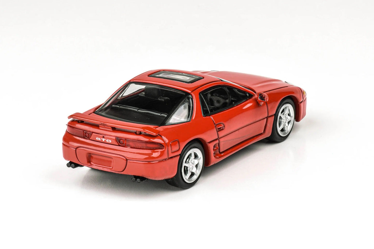 Para64 - Mitsubishi GTO / 3000GT Rouge Caracas - Échelle 1/64 PA-65131 RHD