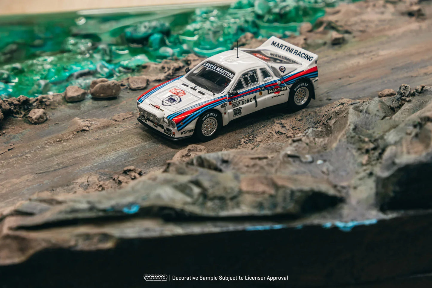 Tarmac Works Lancia 037 Rally - Rally Monte Carlo 1983 Winner W. Rohrl / C. Geistdorfer - Scale 1/64 T64P-TL002-83RMC01