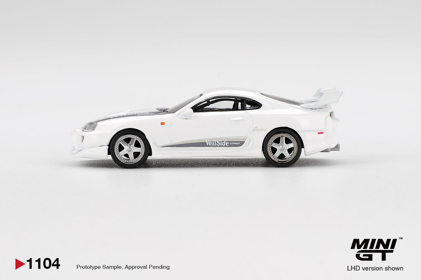 Mini GT - Toyota Supra MK4 ( A80 ) VeilSide Combat VI Blanc nacré métallisé 2014 - Échelle 1/64 MGT01104-L
