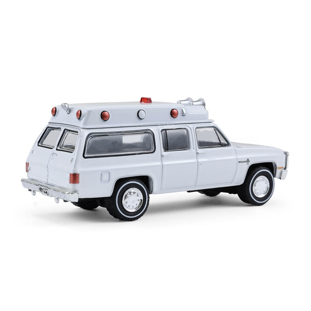 Greenlight Collectibles - Ambulance Chevrolet Suburban Custom Deluxe 1983 - Échelle 1/64