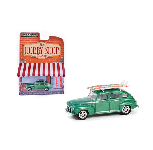 Greenlight Collectibles - 1946 Ford Fordor Super Deluxe Green Metallic with Rack with Surfboards - Series Hobby Shop - Scale 1/64