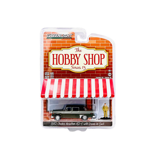Greenlight - 1982 Checker Marathon A12-E Gray with Driver in Suit Figure - The Hobby Shop Series - Scale 1/64