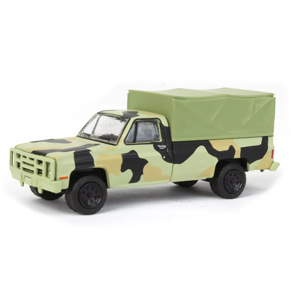 Greenlight - 1984 Chevrolet M1008 CUCV Camouflage with Cargo - Series Battalion 64 - Scala 1/64