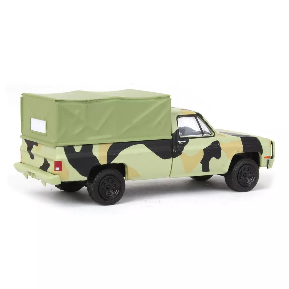 Greenlight - 1984 Chevrolet M1008 CUCV Camouflage with Cargo - Series Battalion 64 - Scala 1/64
