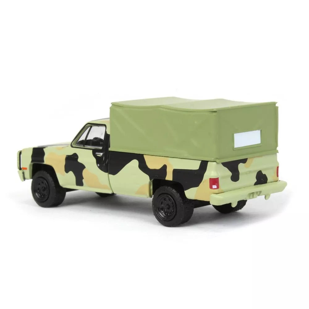 Greenlight - 1984 Chevrolet M1008 CUCV Camouflage with Cargo - Series Battalion 64 - Scala 1/64