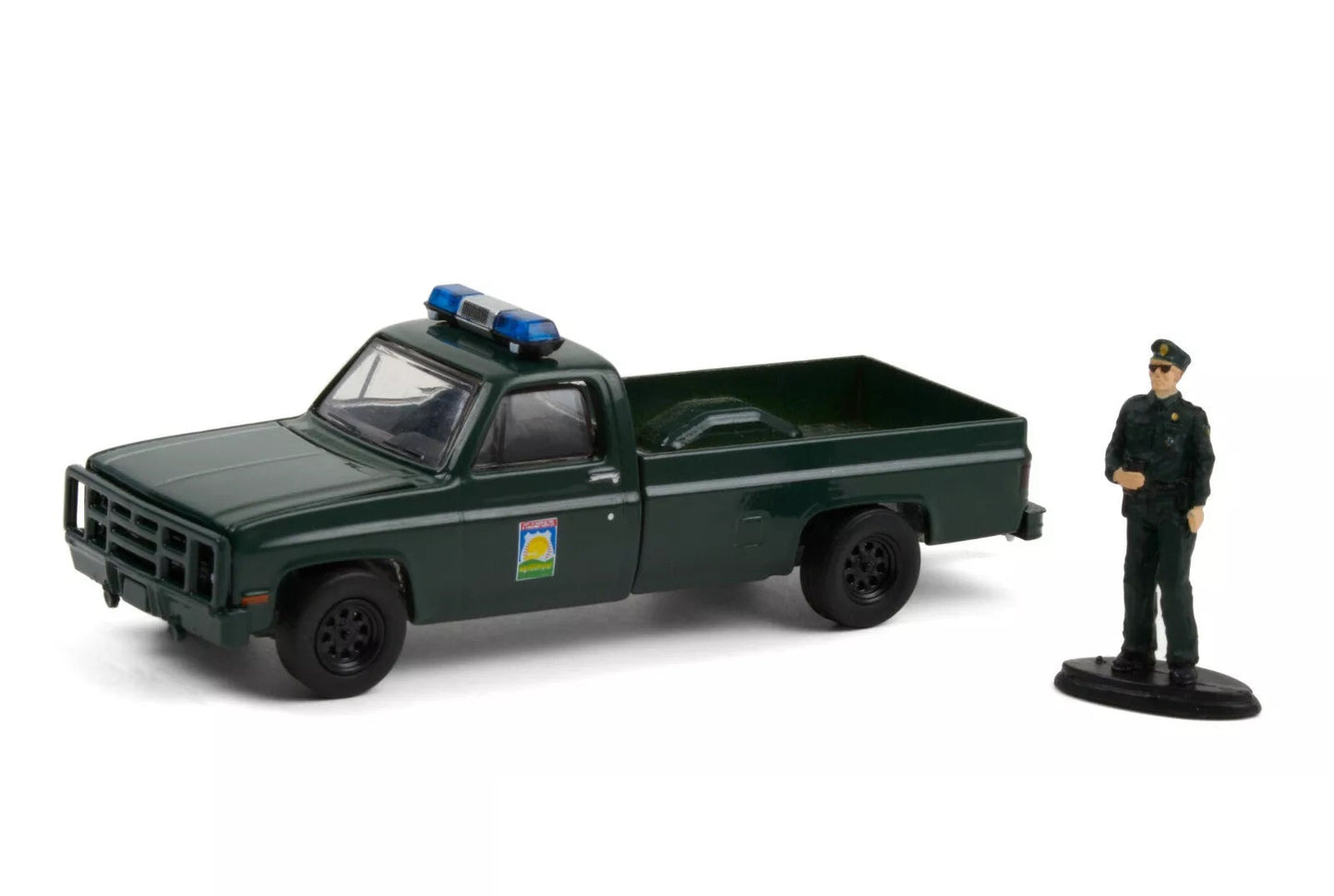 Greenlight - 1986 Chevrolet M1008 with Enforcement Officer Figure Series Hobby Shop - Scale 1/64
