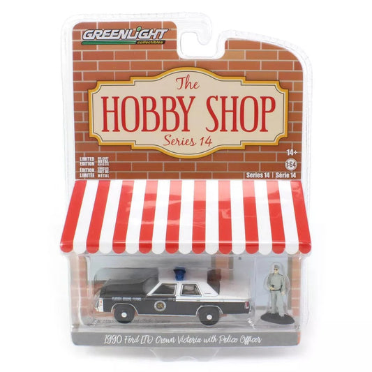 Greenlight - 1990 Ford LTD Crown Victoria with Police Officer Series Hobby Shop - Scale 1/64