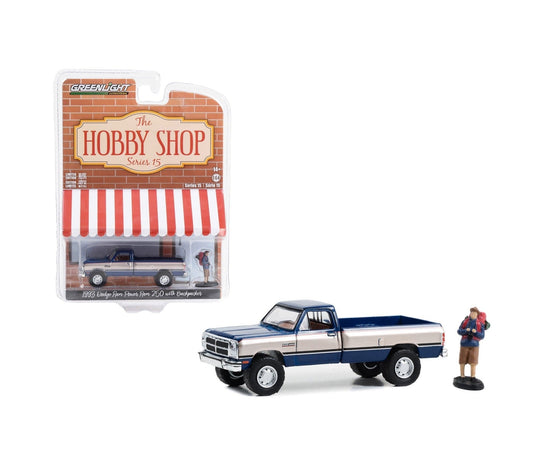 Greenliht Collectibles - 1993 Dodge Ram Power Ram 250 with Backpacker Series Hobby Shop - Scale 1/64