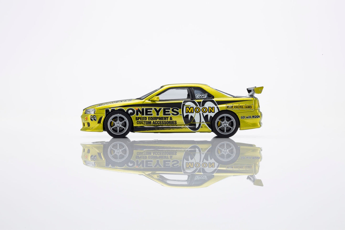 [PRE-ORDER] Kyosho - Nissan Skyline GTR (R34) MOONEYS 1 with led 2026 - Scala 1/64 07134LM1