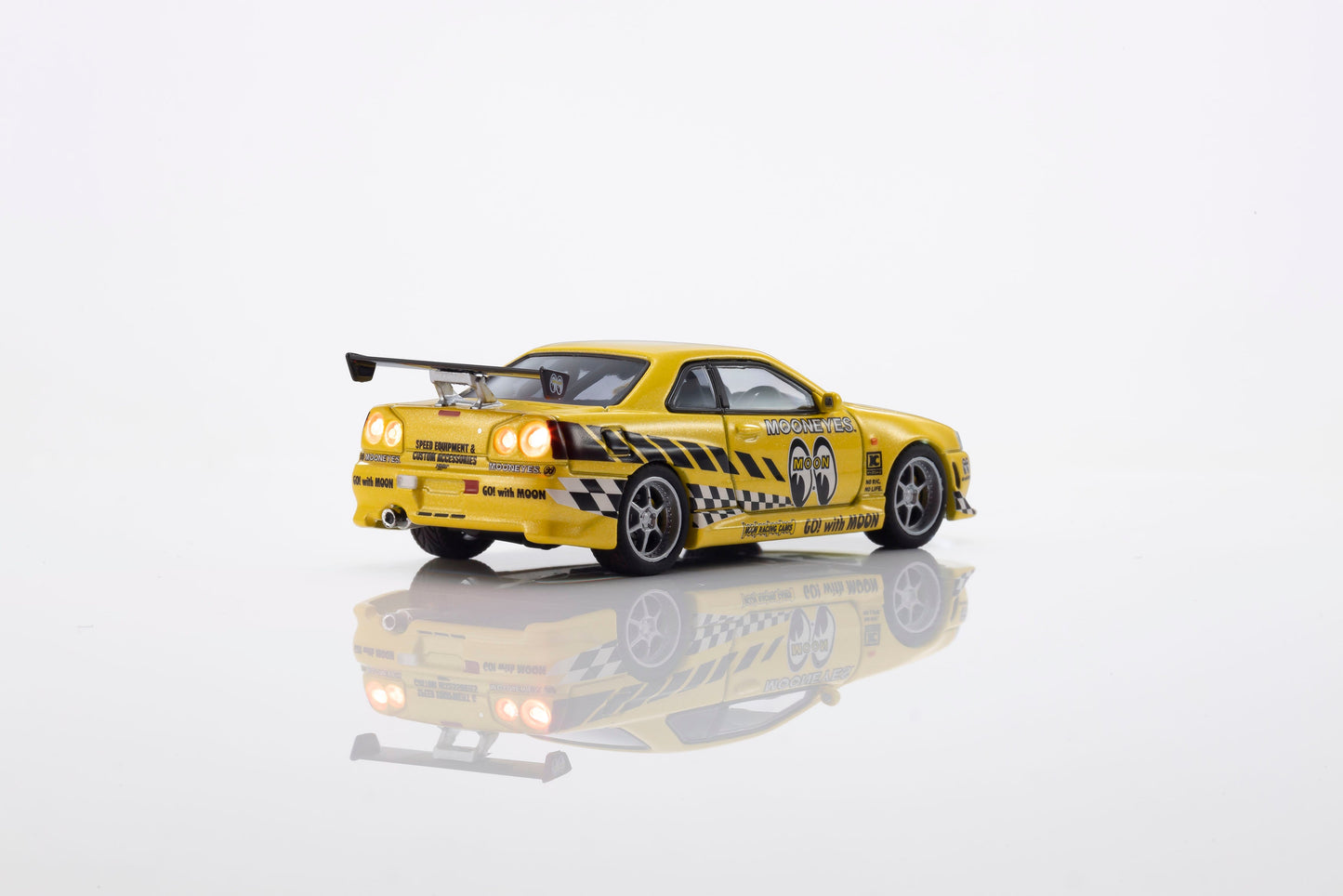 [PRE-ORDER] Kyosho - Nissan Skyline GTR (R34) MOONEYS 2 with led 2026 - Scala 1/64 07134LM2