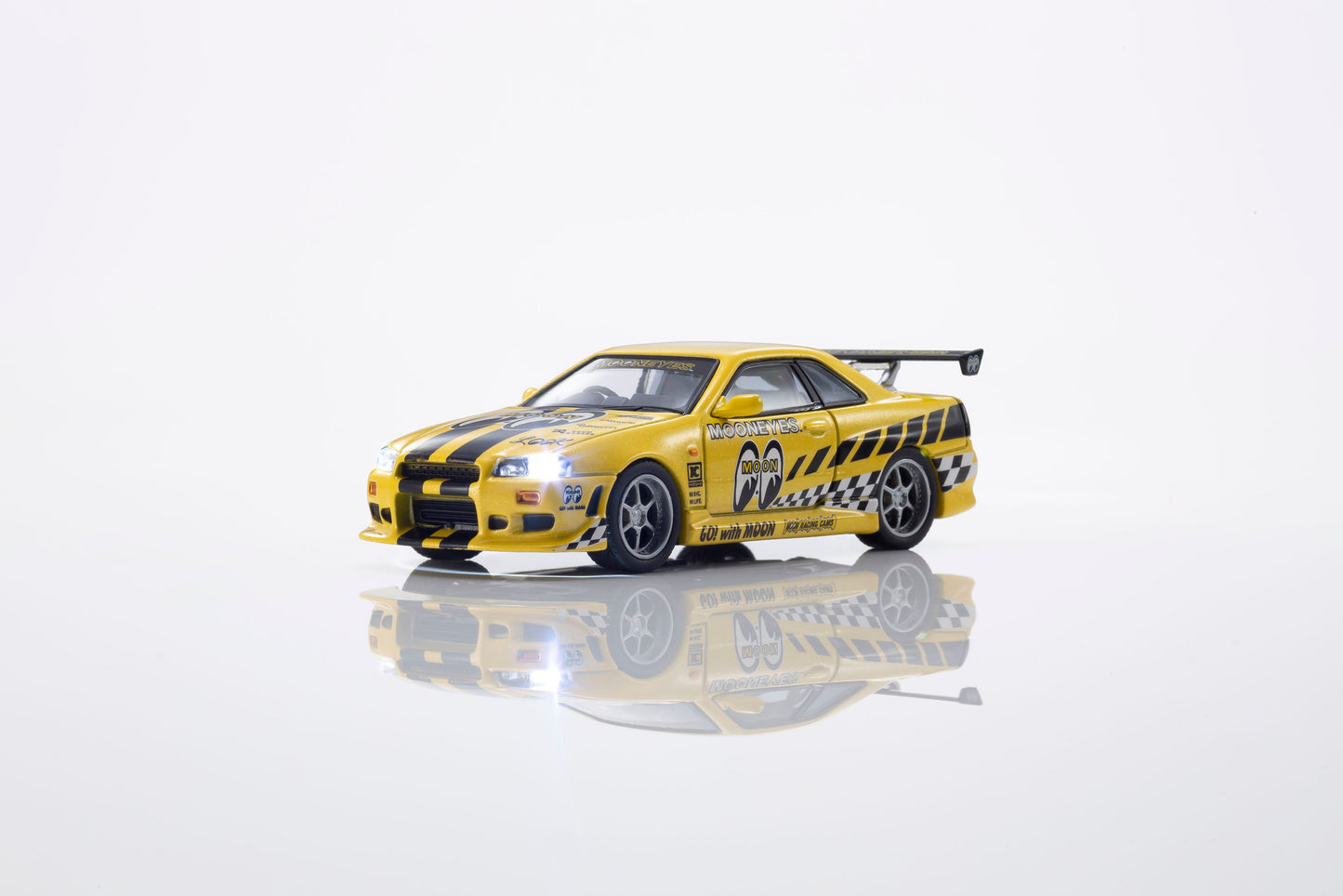 [PRE-ORDER] Kyosho - Nissan Skyline GTR (R34) MOONEYS 2 with led 2026 - Scala 1/64 07134LM2