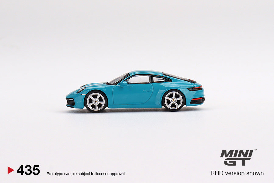 Mini GT - Porsche 911 (992) Carrera S Miami Blue RHD - Scale 1/64 MGT00435-R