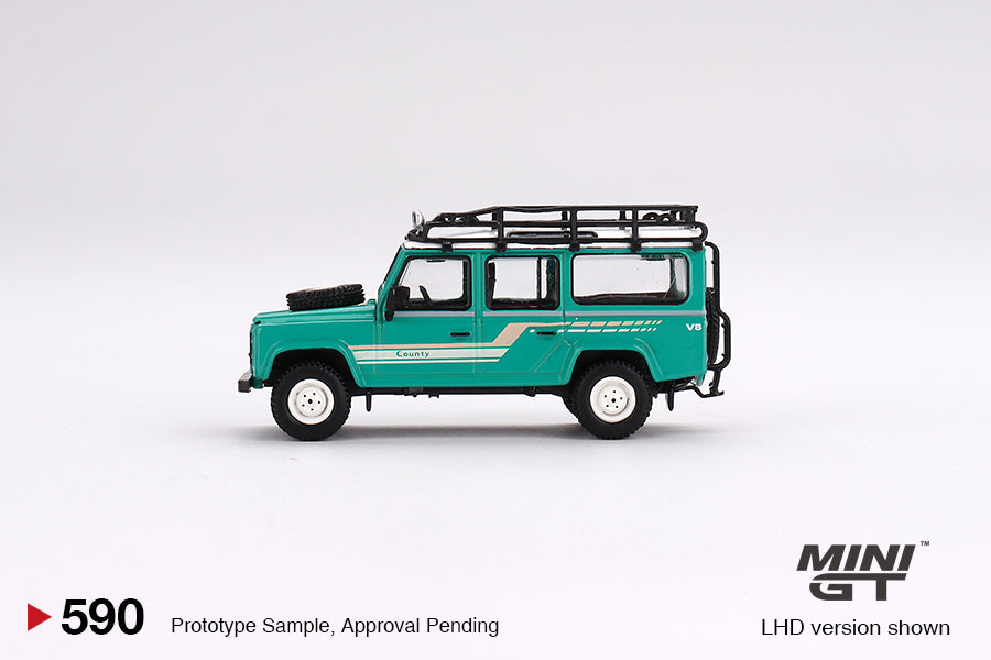 Mini GT - Land Rover Defender 110 1985 County Station Wagon Trident Green - 1/64 Scale MGT00590 R RHD