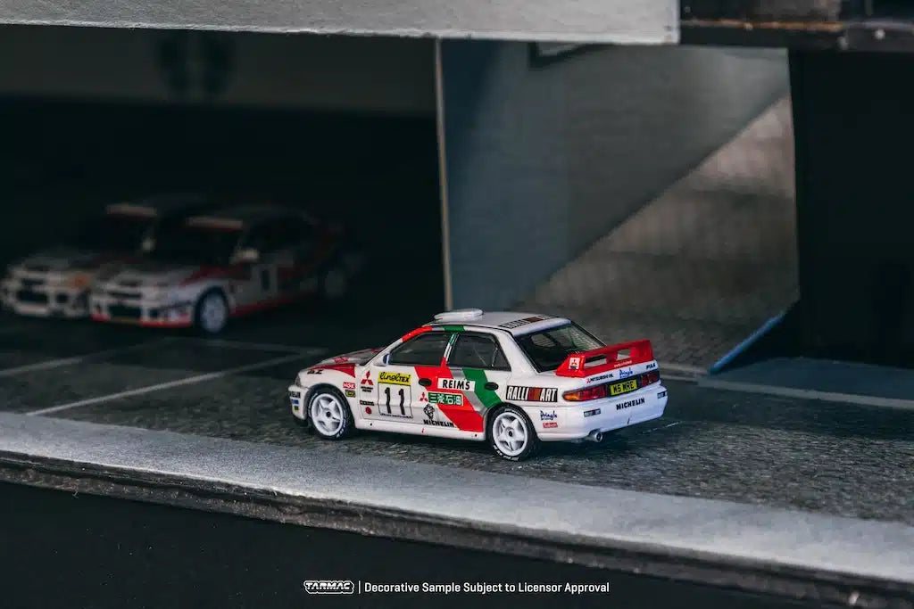 Tarmac Works - Mitsubishi Lancer Evolution II Rallye Monte-Carlo 1995 T. Mäkinen / S. Harjanne - GLOBAL64 - Scale 1/64 T64G-049-95MCR11