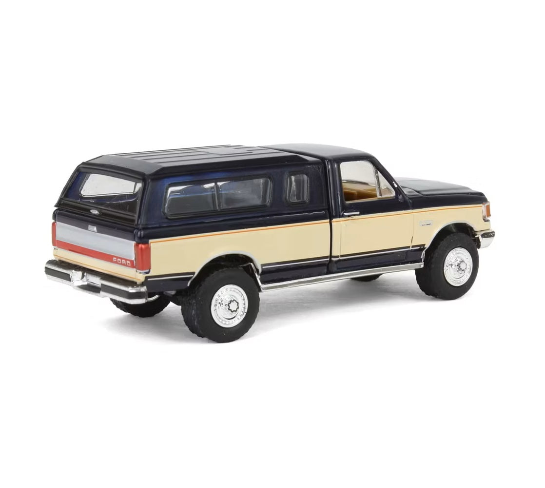 Greenlight - 1991 Ford F-150 XLT Lariat Truck with Camper Shell and Spare Tires - Series Hobby Shop - Scale 1/64